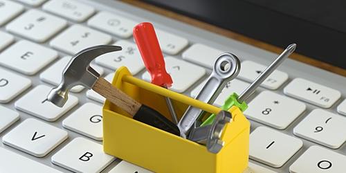 small toolbox on a laptop keyboard